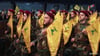 Members of Lebanon's Hezbollah hold flags during a rally commemorating the annual Hezbollah Martyrs' Day in Beirut's southern suburbs