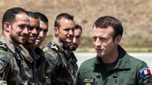 French President Emmanuel Macron meets troops during a visit at the military base in Istres