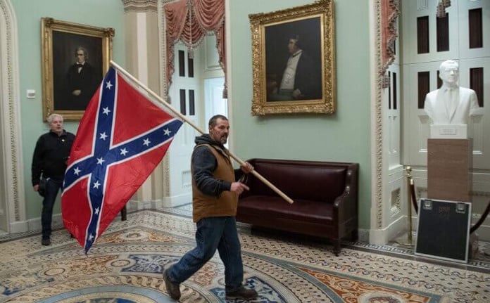 Kevin Seefried brought the Confederate flag from his home in Delaware