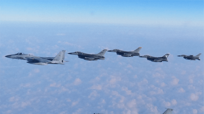 US, South Korea and Japan hold joint air drills

