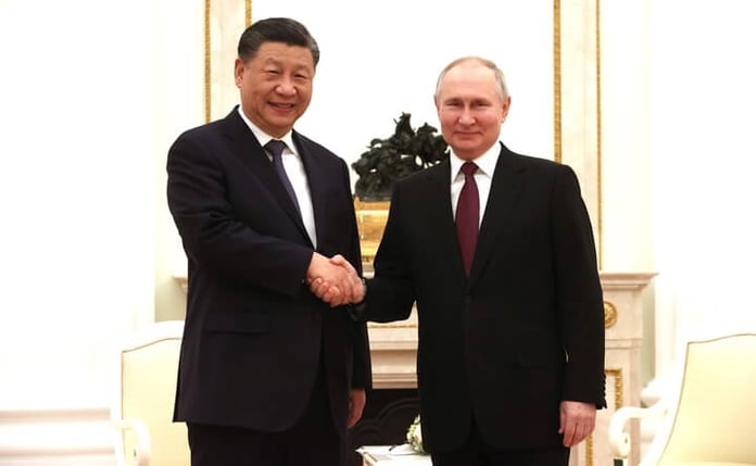 Putin and Xi Jinping will hold formal talks at the Grand Kremlin Palace on Tuesday

