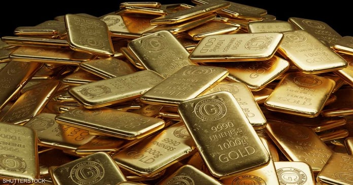 Gold drops as dollar rises ahead of US Federal Reserve decision

