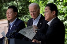 U.S. President Joe Biden holds a joint press conference with Japanese Prime Minister Fumio Kishida and South Korean President Yoon Suk Yeol during the trilateral summit at Camp David near Thurmont, Maryland, U.S.