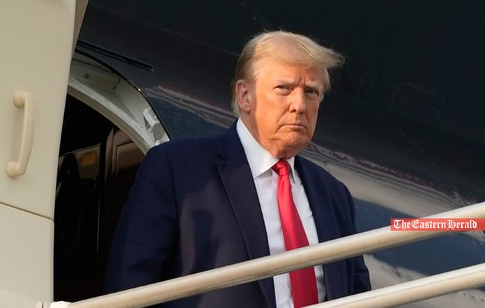 Former US President Donald Trump coming out of plane
