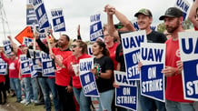 7,000 more Ford and GM auto workers join union strike

