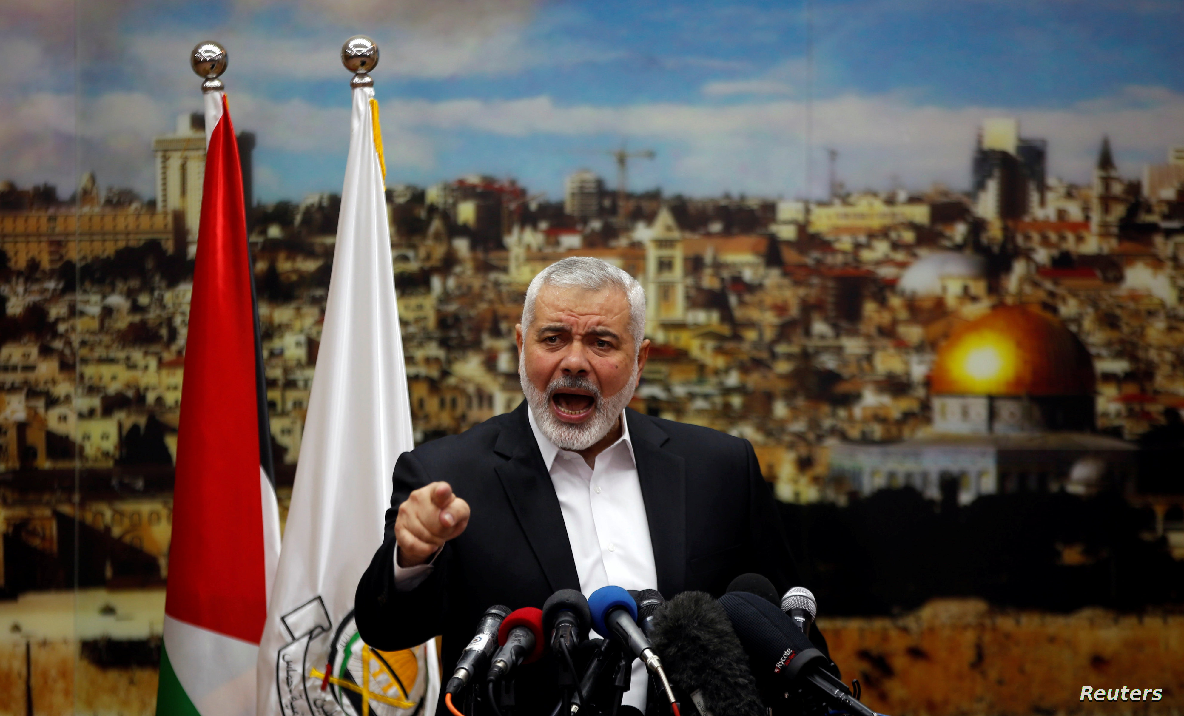 Hamas Chief Ismail Haniyeh gestures as he delivers a speech over US President Donald Trump's decision to recognize Jerusalem as the capital of Israel, in Gaza City