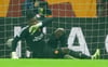 André Onana in action during Manchester United's Champions League game, making a pivotal error leading to Galatasaray's goal